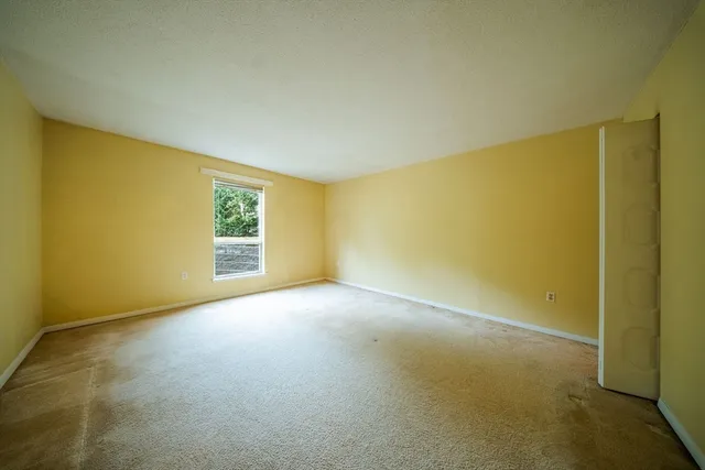 an empty room with a natural light