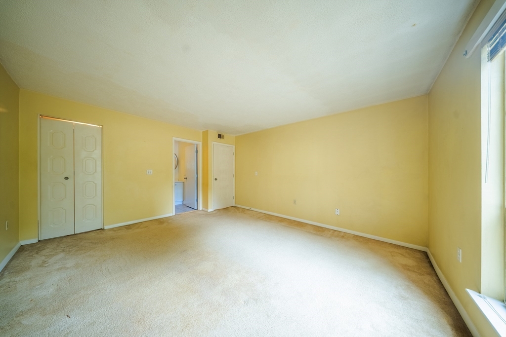 3 Shadowbrook Lane, Unit 3 Milford, MA 01757 - Photo 24 of 35 an empty room with a natural light