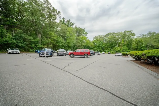 an aerial view of a house with a swimming pool