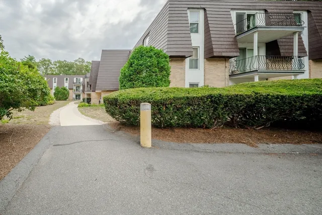 an aerial view of residential house with outdoor space