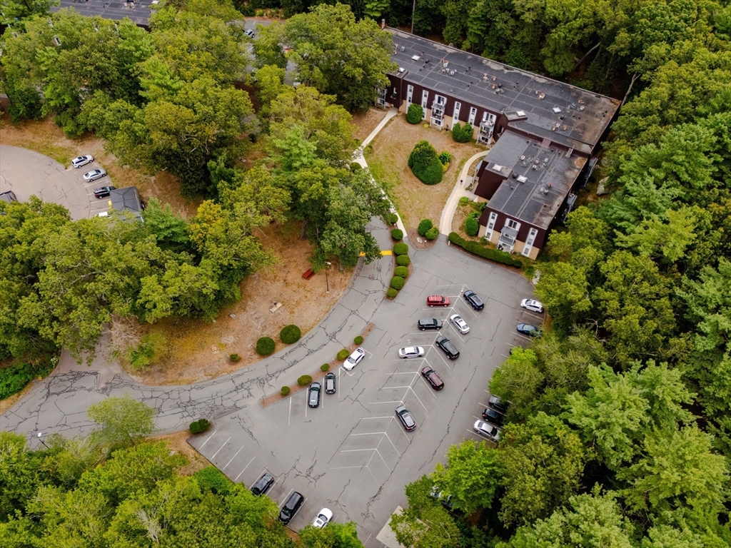 3 Shadowbrook Lane, Unit 3 Milford, MA 01757 - Photo 32 of 35 an aerial view of a house with a garden and swimming pool