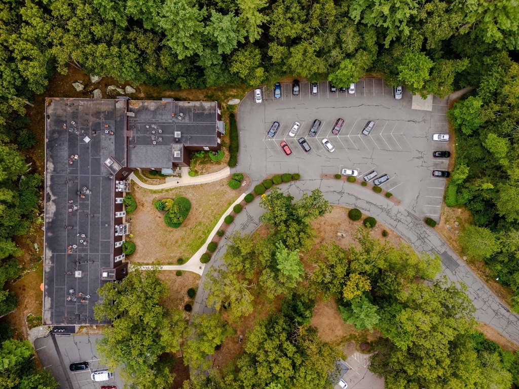3 Shadowbrook Lane, Unit 3 Milford, MA 01757 - Photo 33 of 35 an aerial view of a house with a swimming pool