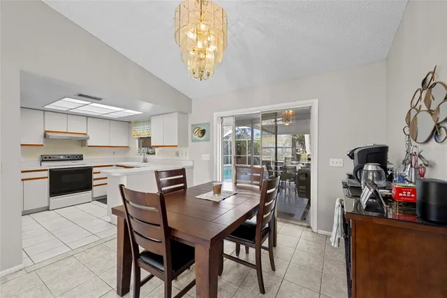 a view of a dining room kitchen and a window