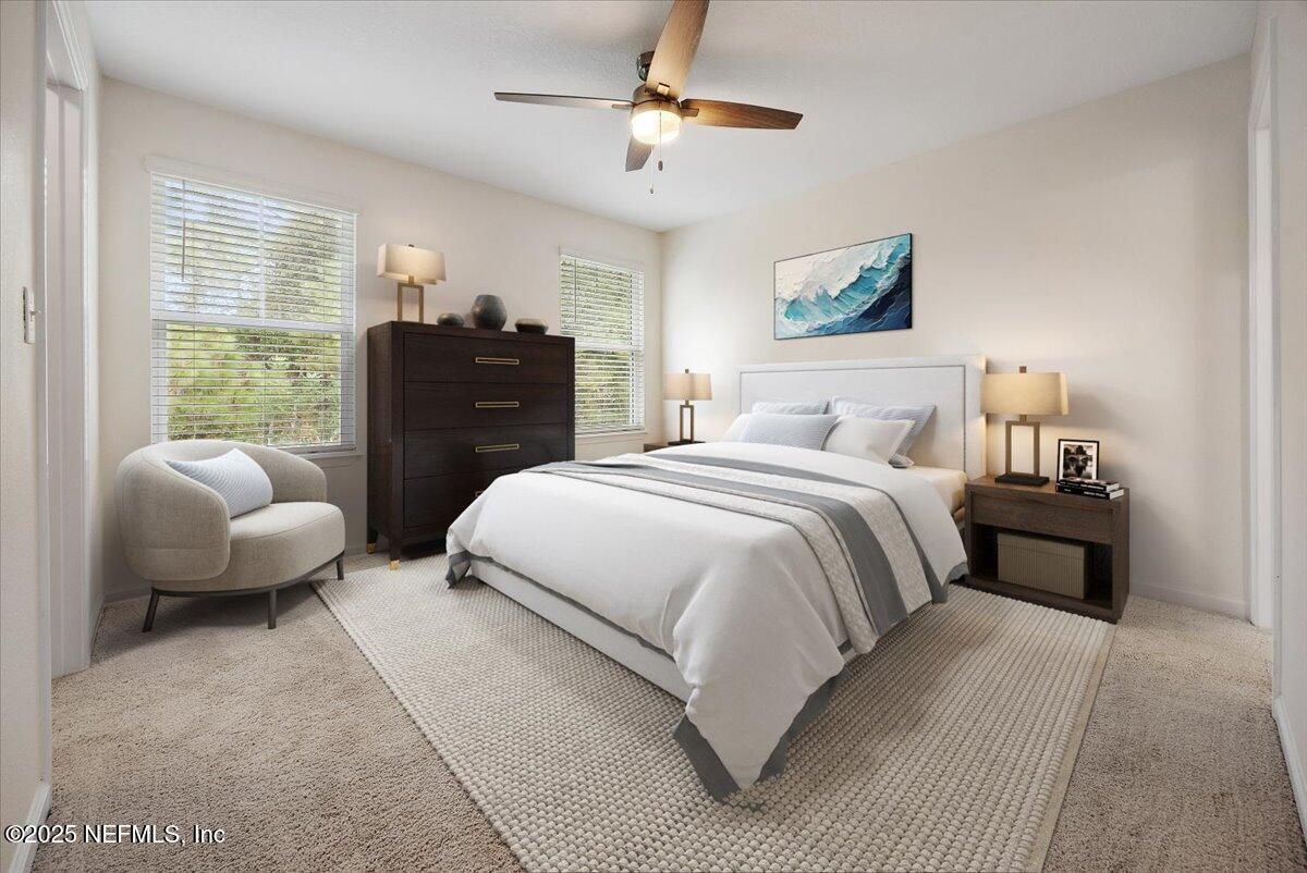 54 Ridge Lake Rd Street St. Augustine, FL 32086 - Photo 11 of 25 a bedroom with a bed and ceiling lamp