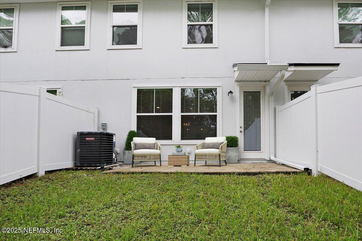 54 Ridge Lake Rd Street St. Augustine, FL 32086 - Photo 22 of 25 a view of a house with backyard