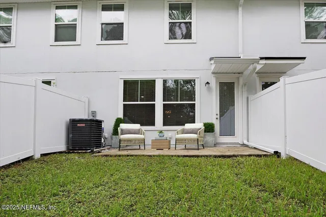 a view of a lake with a sitting area