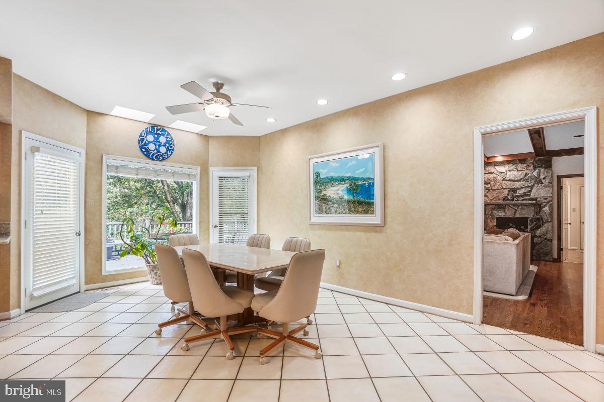 11521 Twining Lane Potomac, MD 20854 - Photo 12 of 31 a view of a dining room with furniture window and outside view