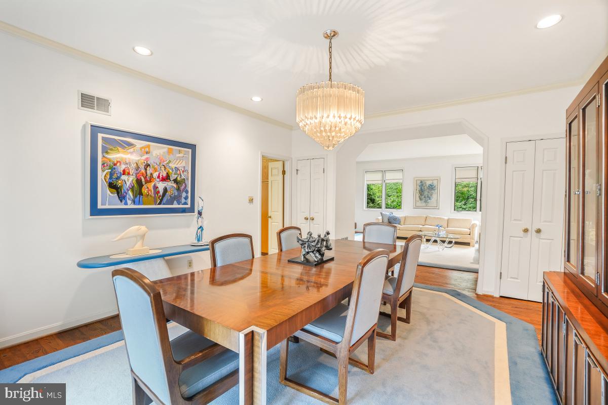 11521 Twining Lane Potomac, MD 20854 - Photo 6 of 31 a view of a dining room with furniture window and wooden floor