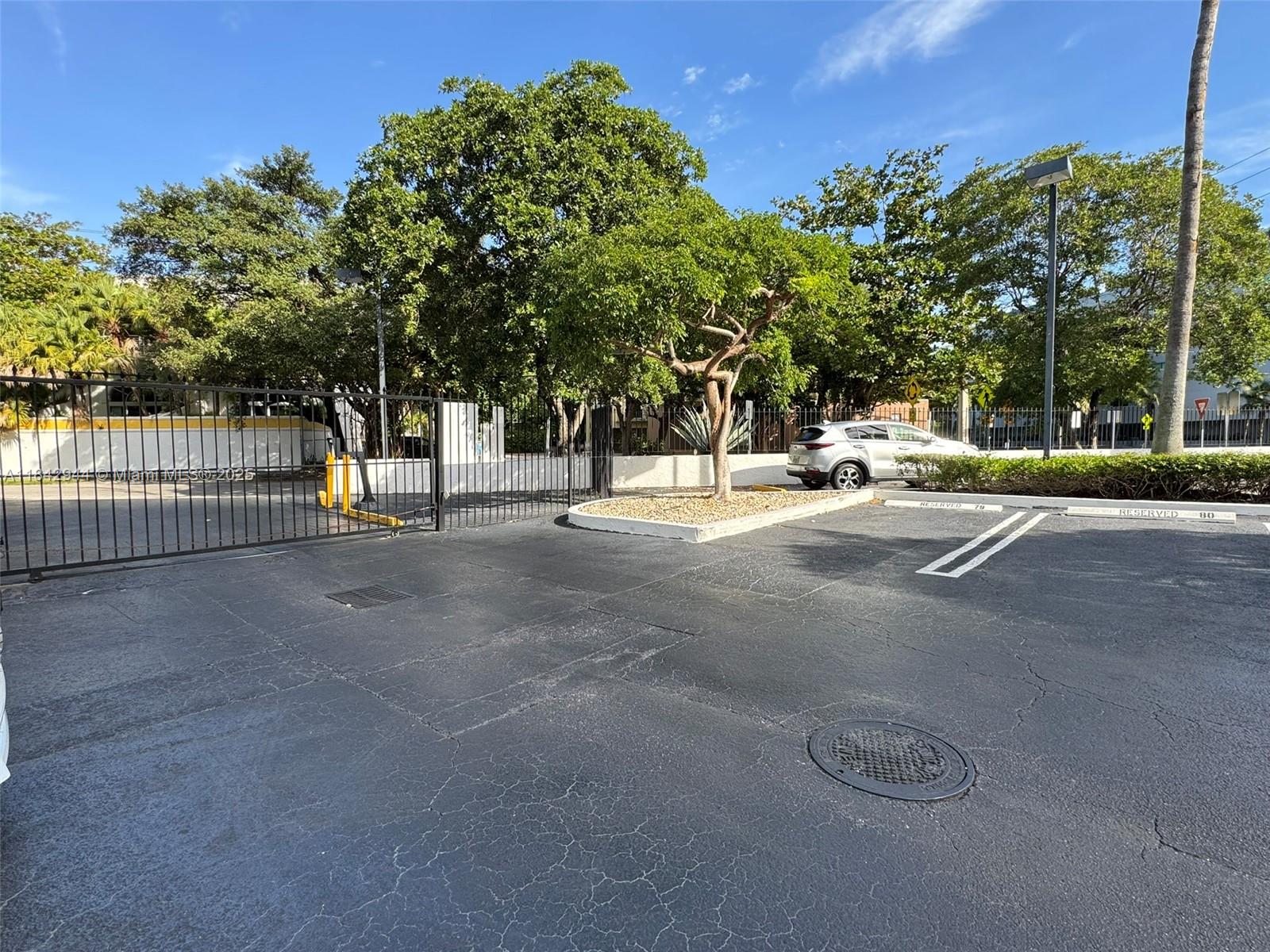 2715 Tigertail Avenue, Unit 404 Miami, FL 33133 - Photo 21 of 22 a view of a street with a houses