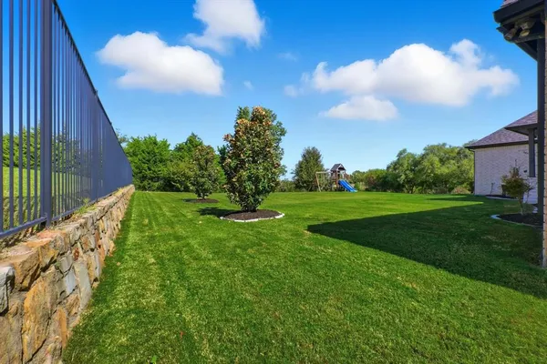 a view of building with garden