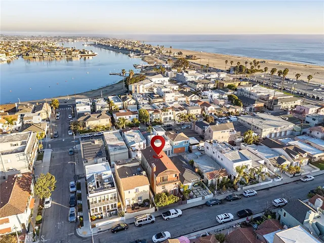 a front view of a building with a yard