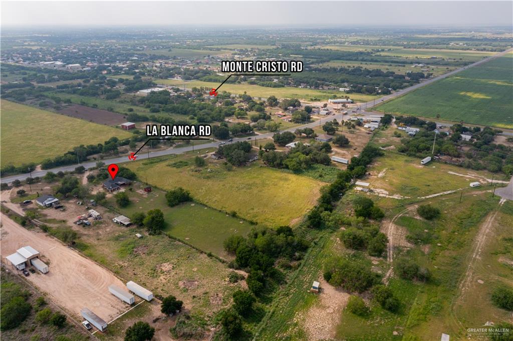 20724 North Fm 493 Road Edinburg, TX 78542 - Photo 26 of 29 Aerial view of property and surrounding area featuring rural landscape