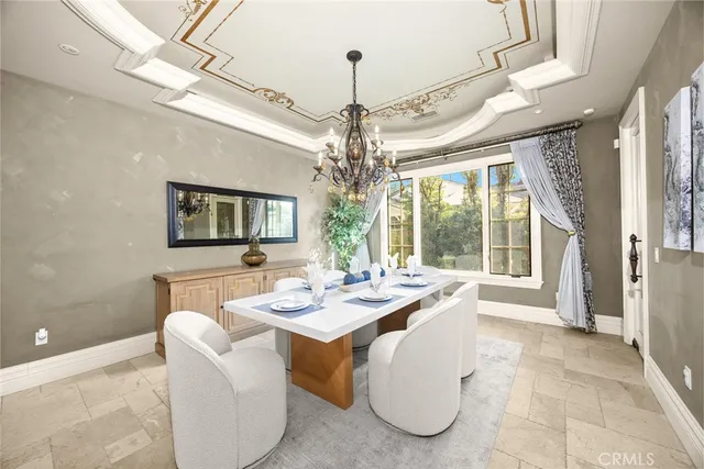 a view of a porch with furniture and floor to ceiling window