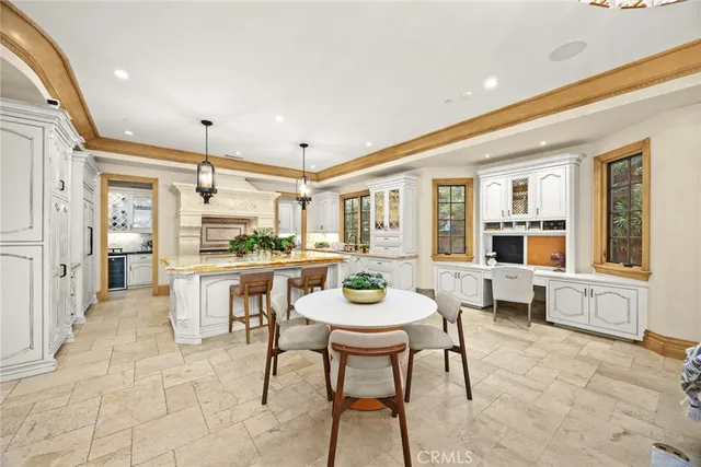 a spacious kitchen with a stove and a sink