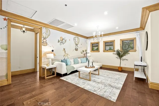 a spacious bathroom with a tub sink and a mirror