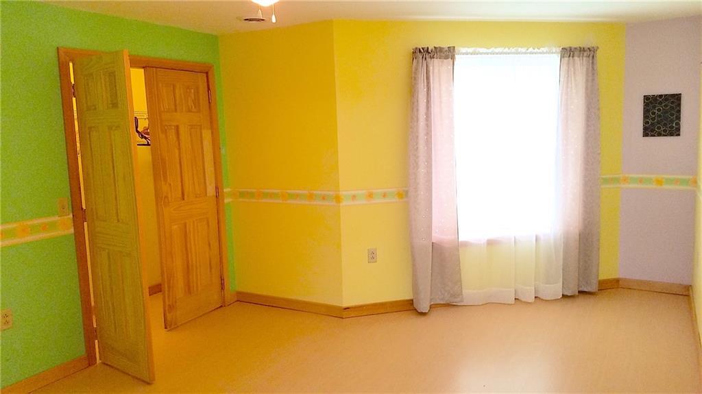 2269 Chapman Road Mapleton, ME 04757 - Photo 30 of 35 Bedroom 3 in the basement with large...