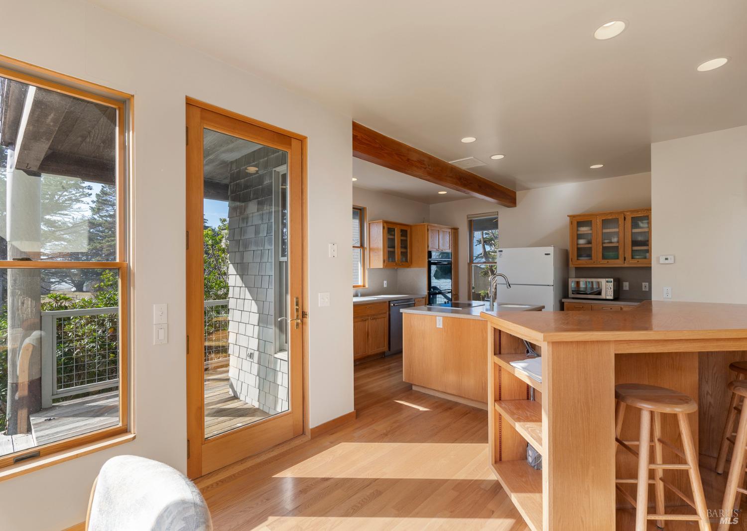 116 Shepherds Close The Sea Ranch, CA 95497 - Photo 13 of 65 a living room with stainless steel appliances furniture and a rug