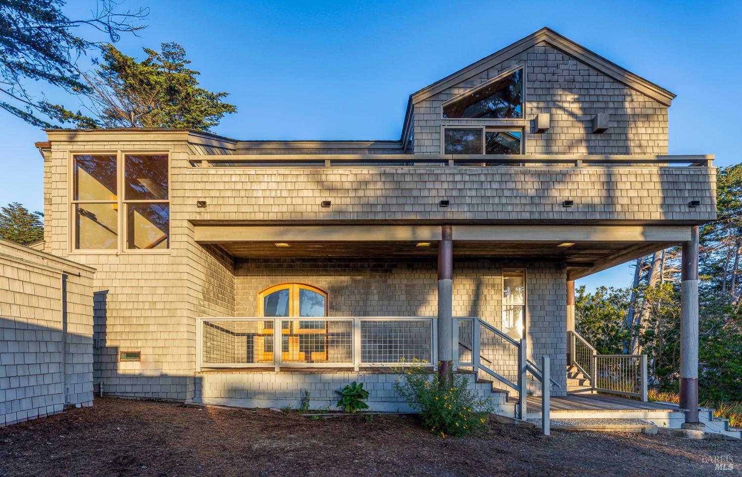 116 Shepherds Close The Sea Ranch, CA 95497 - Photo 47 of 65 a front view of a house with a porch