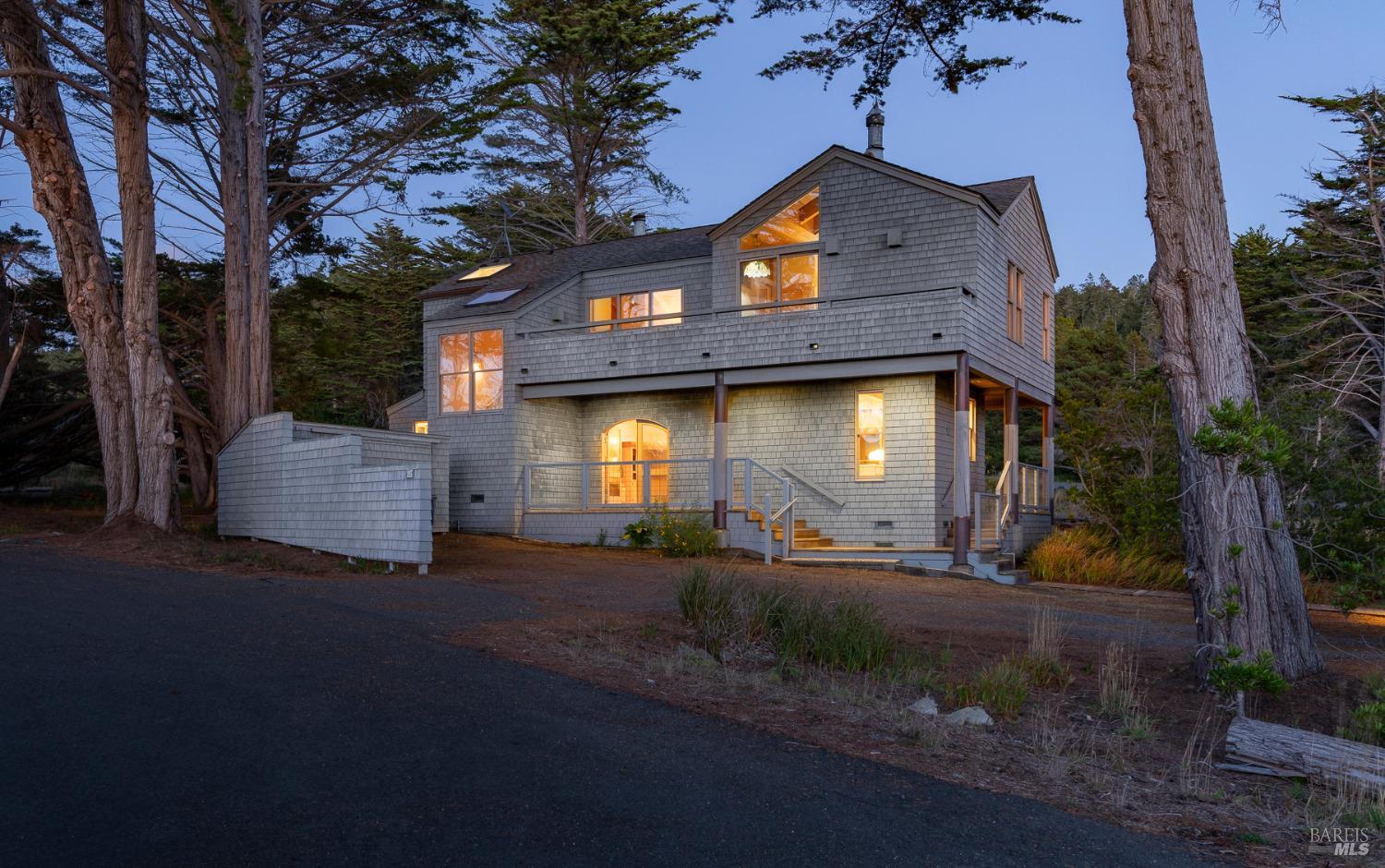 116 Shepherds Close The Sea Ranch, CA 95497 - Photo 61 of 65 a front view of a house with a yard