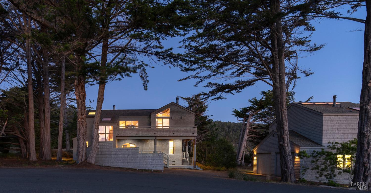 116 Shepherds Close The Sea Ranch, CA 95497 - Photo 62 of 65 a front view of a house with a yard
