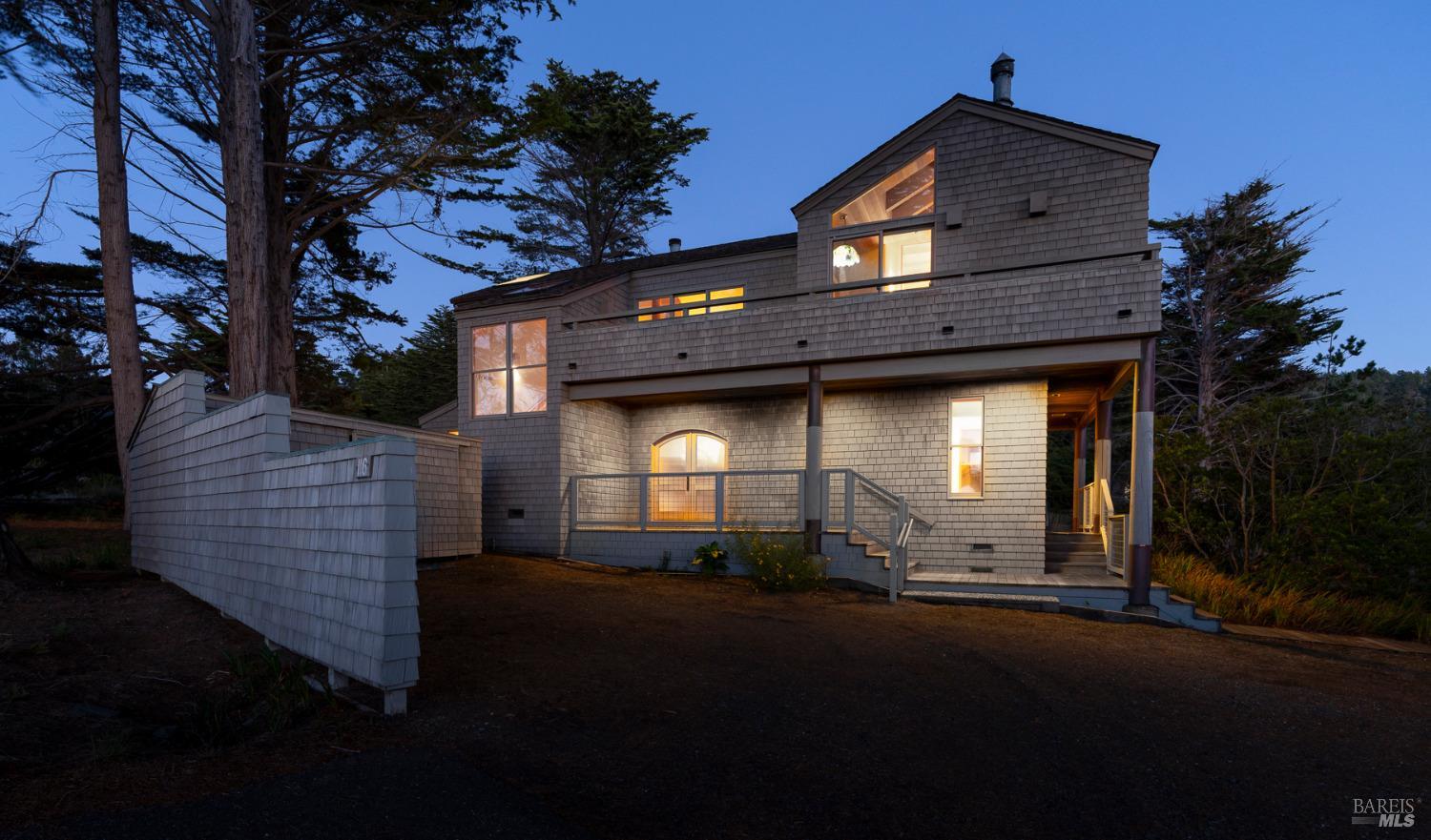 116 Shepherds Close The Sea Ranch, CA 95497 - Photo 63 of 65 a front view of a house with a yard