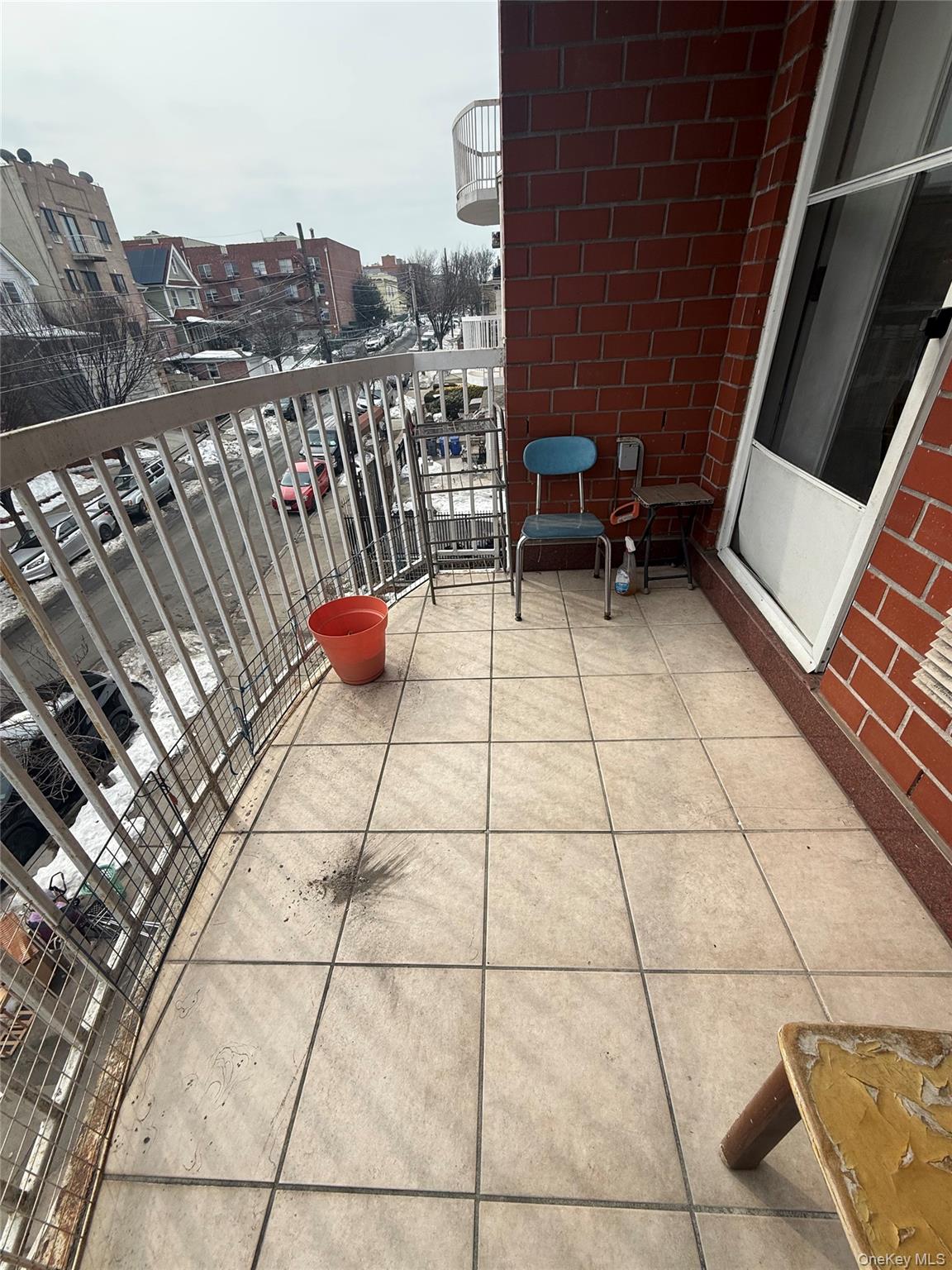 112-31 38th Avenue, Unit 3D Queens, NY 11368 - Photo 8 of 8 a view of a terrace with seating space