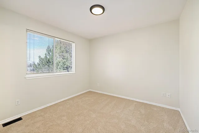 a bathroom with a sink vanity and a mirror