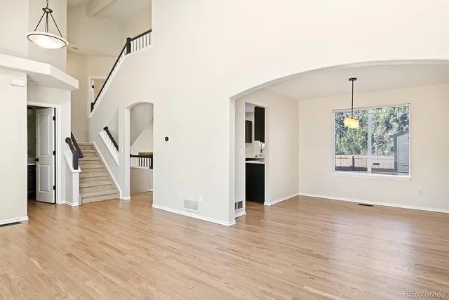 a view of entryway with wooden floor