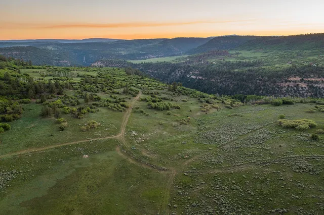 a view of an outdoor space and mountain view in back