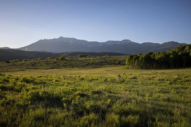 a view of lake and mountain