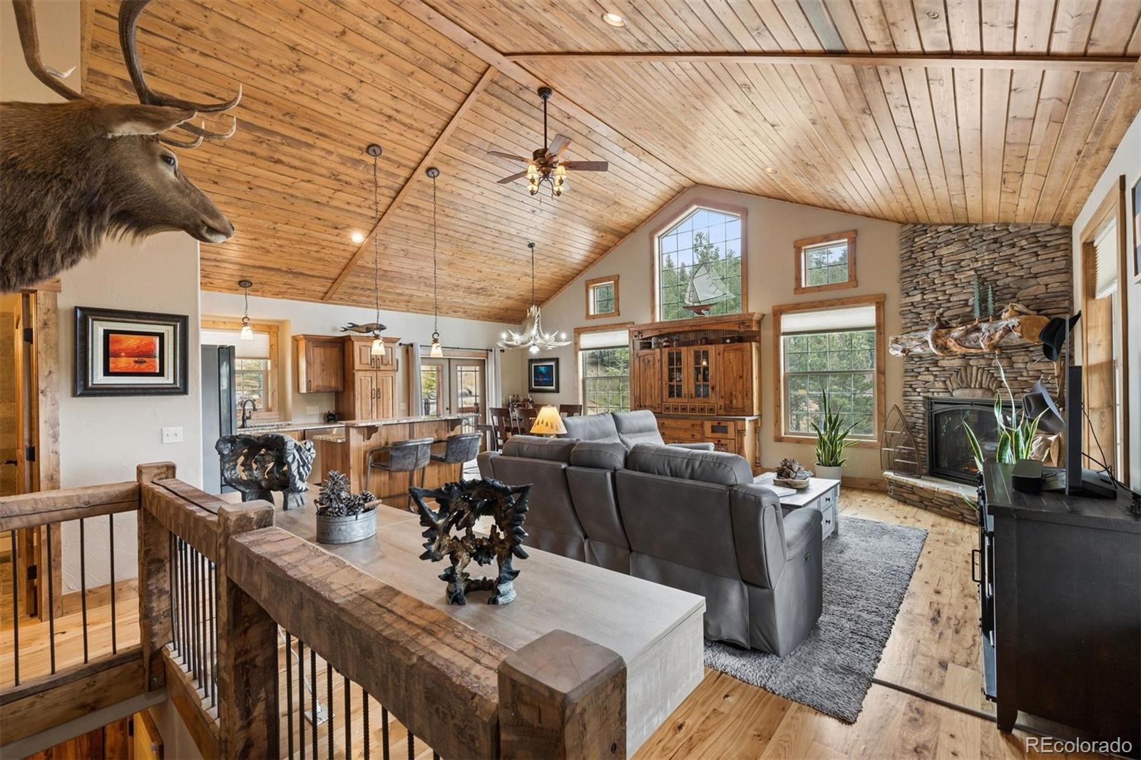2894 County Road 43 Bailey, CO 80421 - Photo 7 of 40 a view of a dining room with furniture window and outside view