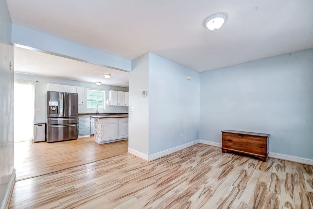 40 Sawyer Street Gardner, MA 01440 - Photo 14 of 37 a view of kitchen and wooden floor