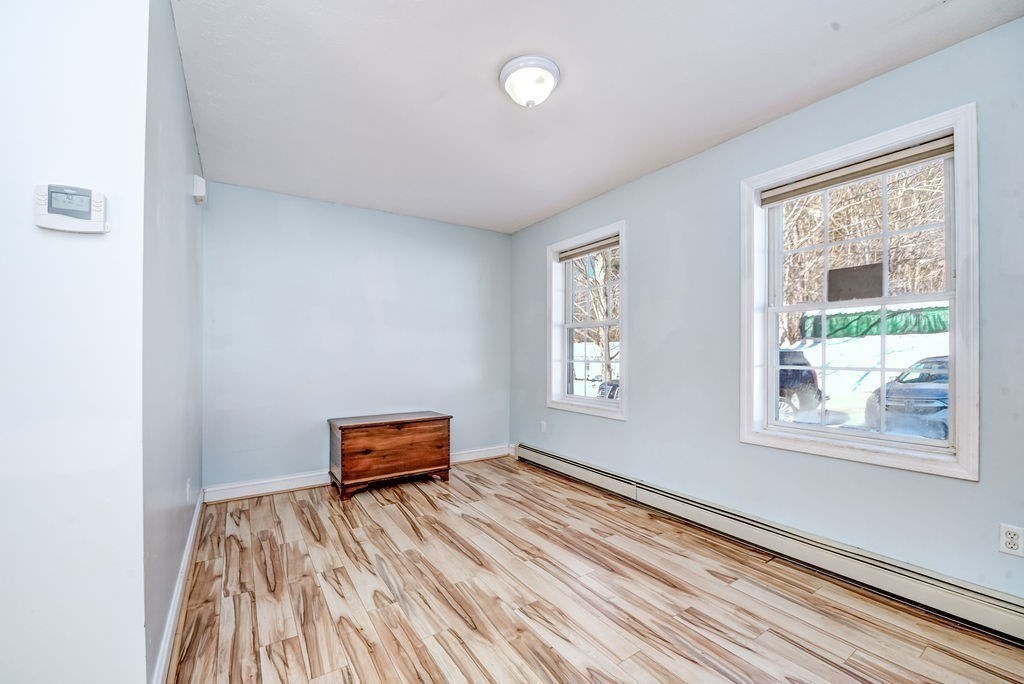 40 Sawyer Street Gardner, MA 01440 - Photo 16 of 37 a bedroom with bed and window