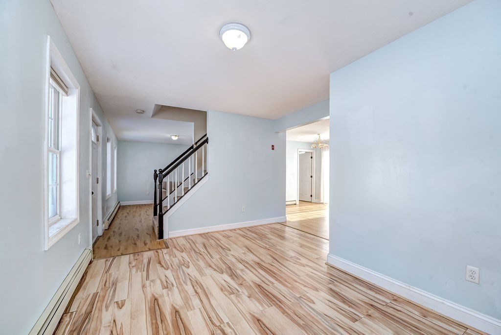 40 Sawyer Street Gardner, MA 01440 - Photo 17 of 37 a view of an entryway with wooden floor