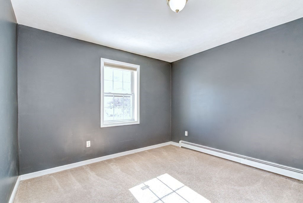 40 Sawyer Street Gardner, MA 01440 - Photo 24 of 37 an empty room with a window