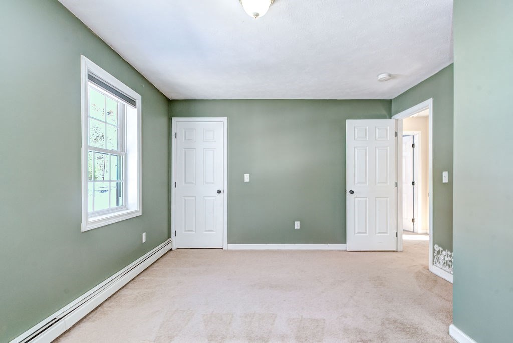 40 Sawyer Street Gardner, MA 01440 - Photo 27 of 37 a view of an empty room with a window