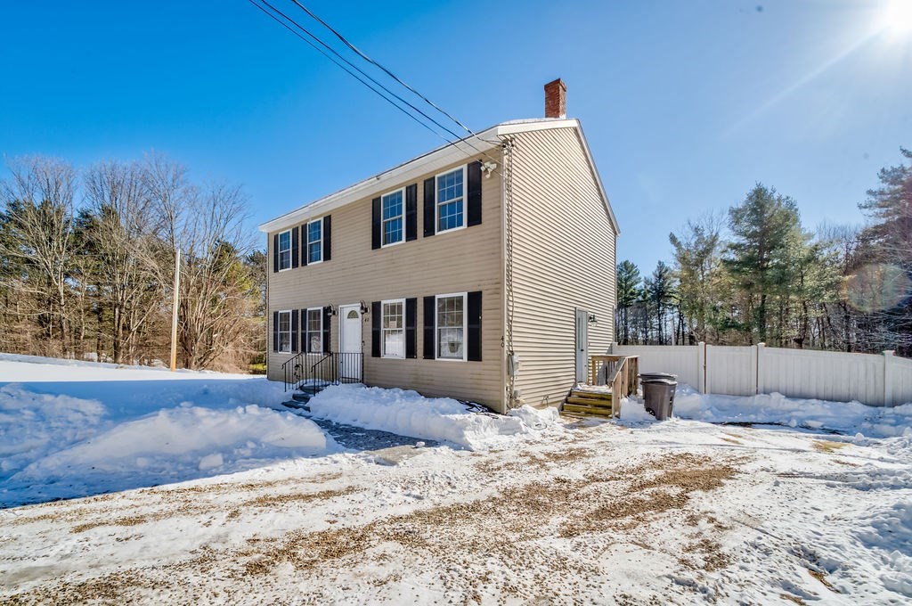 40 Sawyer Street Gardner, MA 01440 - Photo 33 of 37 a view of a house with a yard