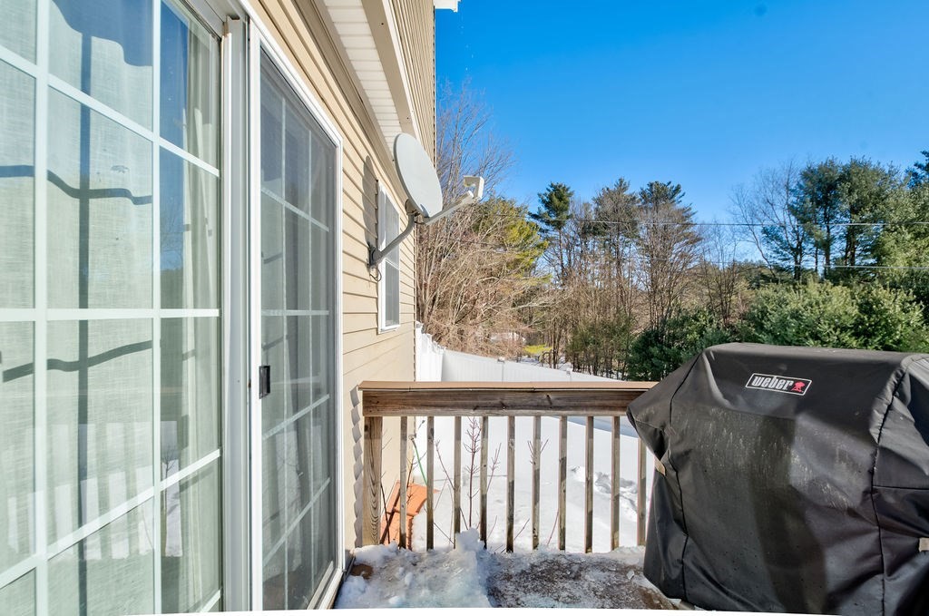 40 Sawyer Street Gardner, MA 01440 - Photo 35 of 37 a view of a balcony with trees and plants