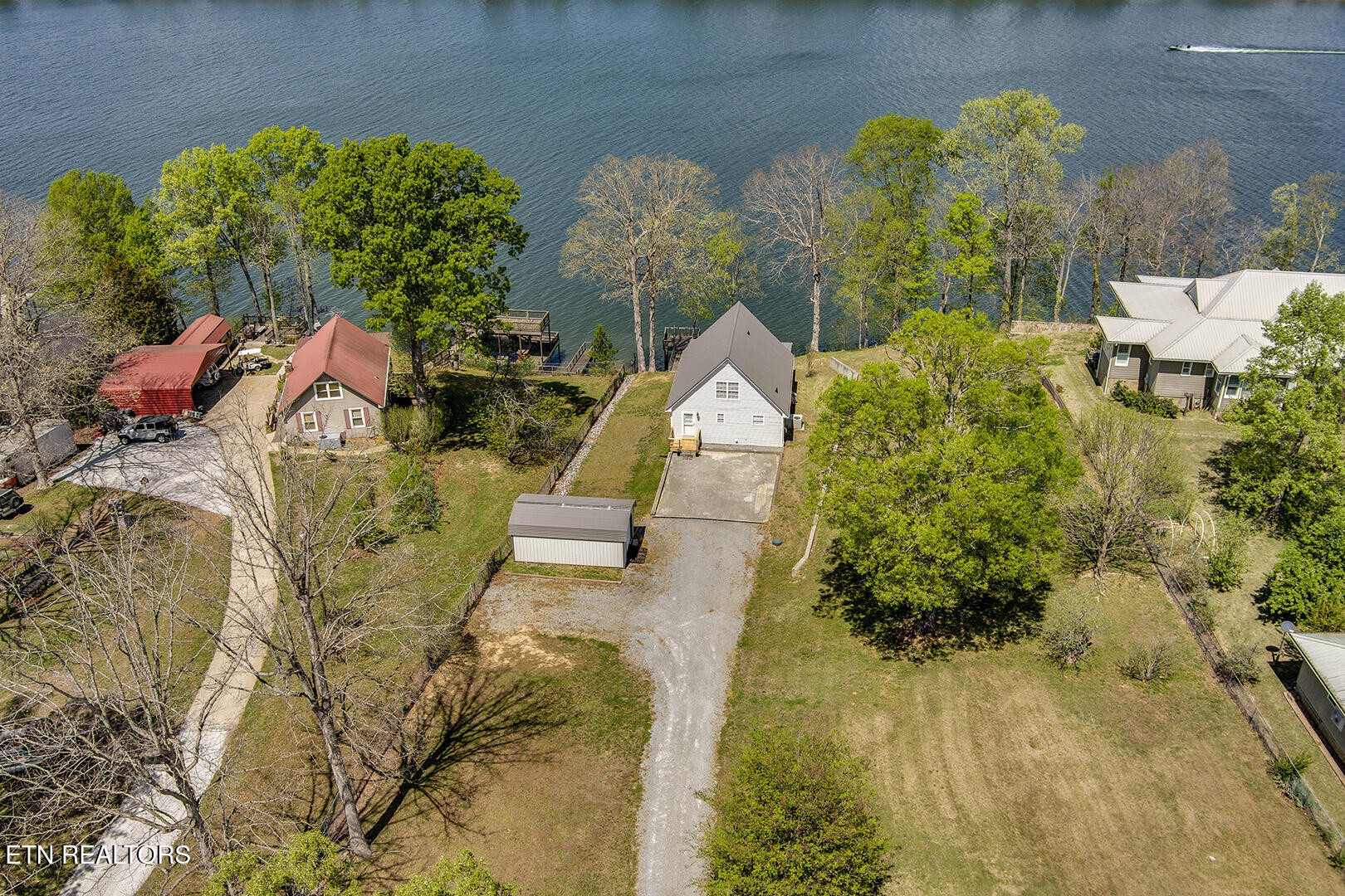 609 Lakewood Drive Decatur, TN 37322 - Photo 1 of 60 an aerial view of a house with swimming pool and large trees