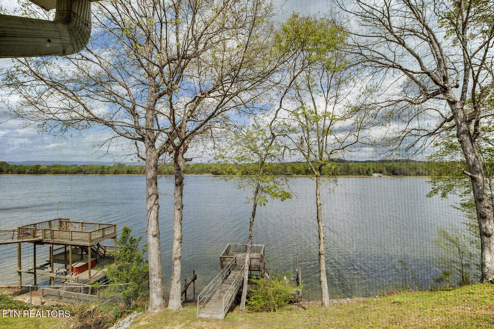609 Lakewood Drive Decatur, TN 37322 - Photo 13 of 60 a backyard of a house with lots of green space and lake view