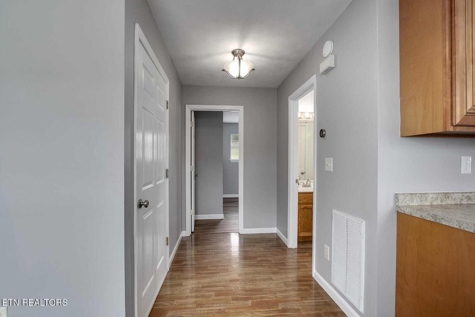609 Lakewood Drive Decatur, TN 37322 - Photo 16 of 60 a view of a hallway with a dining room