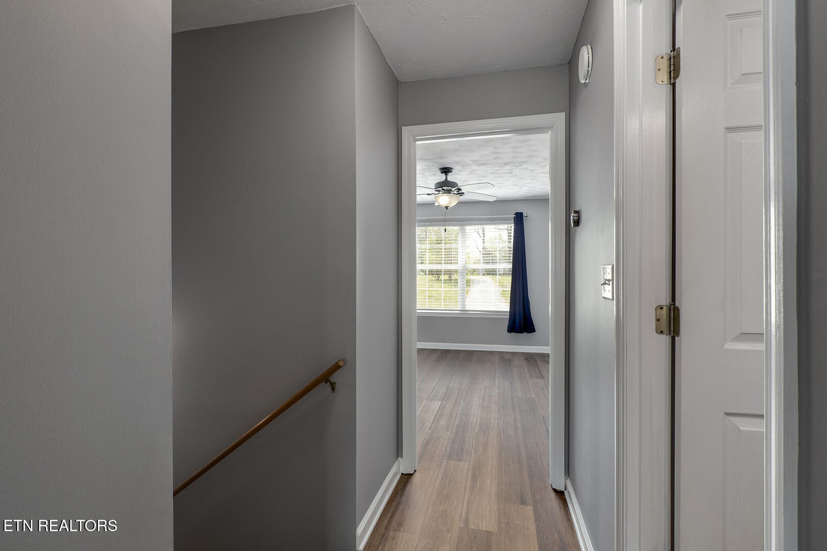 609 Lakewood Drive Decatur, TN 37322 - Photo 22 of 60 a view of a hallway with wooden floor