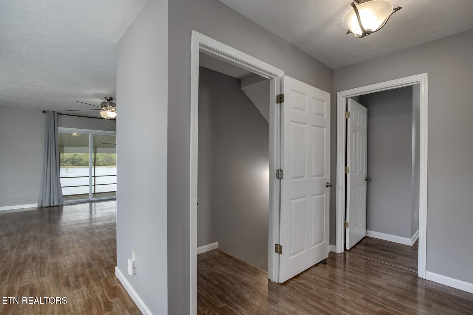 609 Lakewood Drive Decatur, TN 37322 - Photo 29 of 60 a view of an empty room with wooden floor and a window