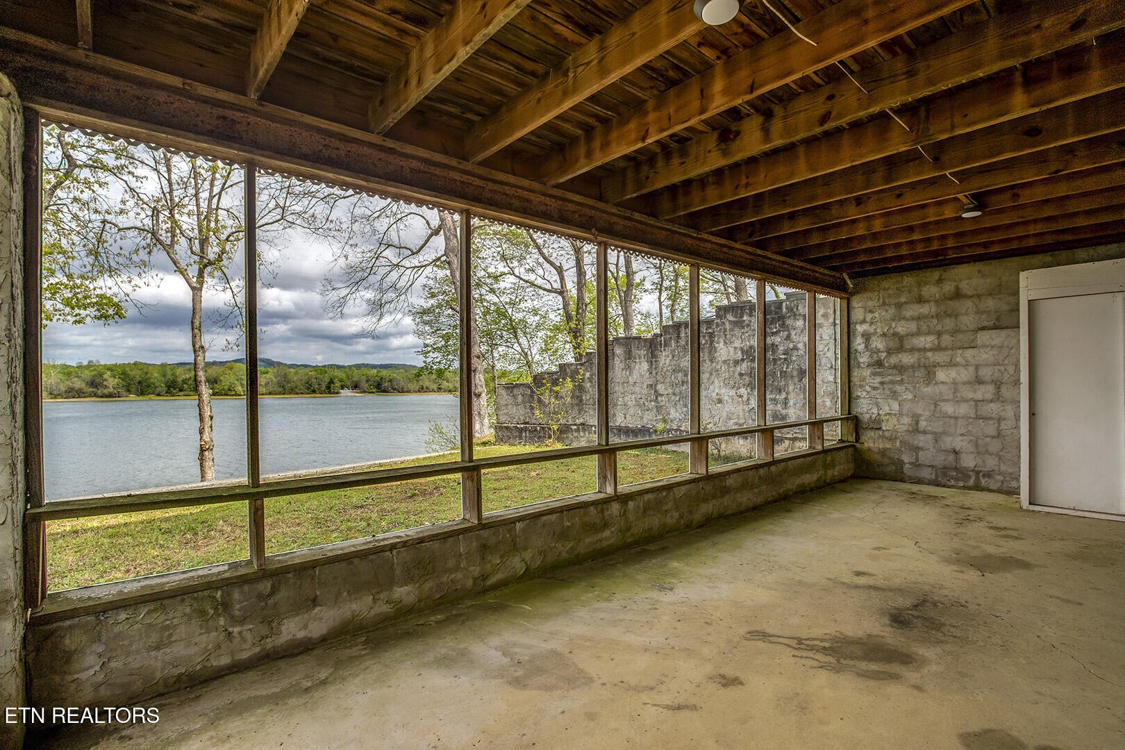 609 Lakewood Drive Decatur, TN 37322 - Photo 37 of 60 a view of an empty room with sliding glass door