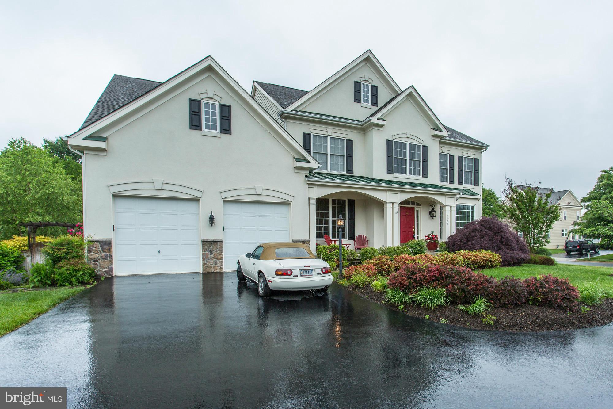 9070 Roaring Spring Loop Bristow, VA 20136 - Photo 2 of 30 Large driveway with turn around space