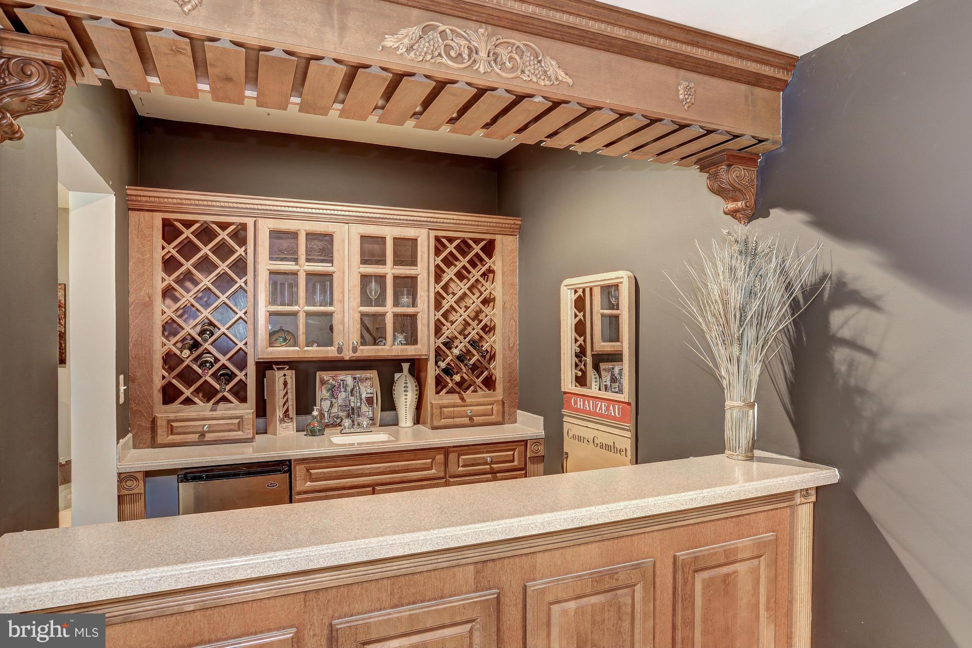 9070 Roaring Spring Loop Bristow, VA 20136 - Photo 27 of 30 Wet bar in basement