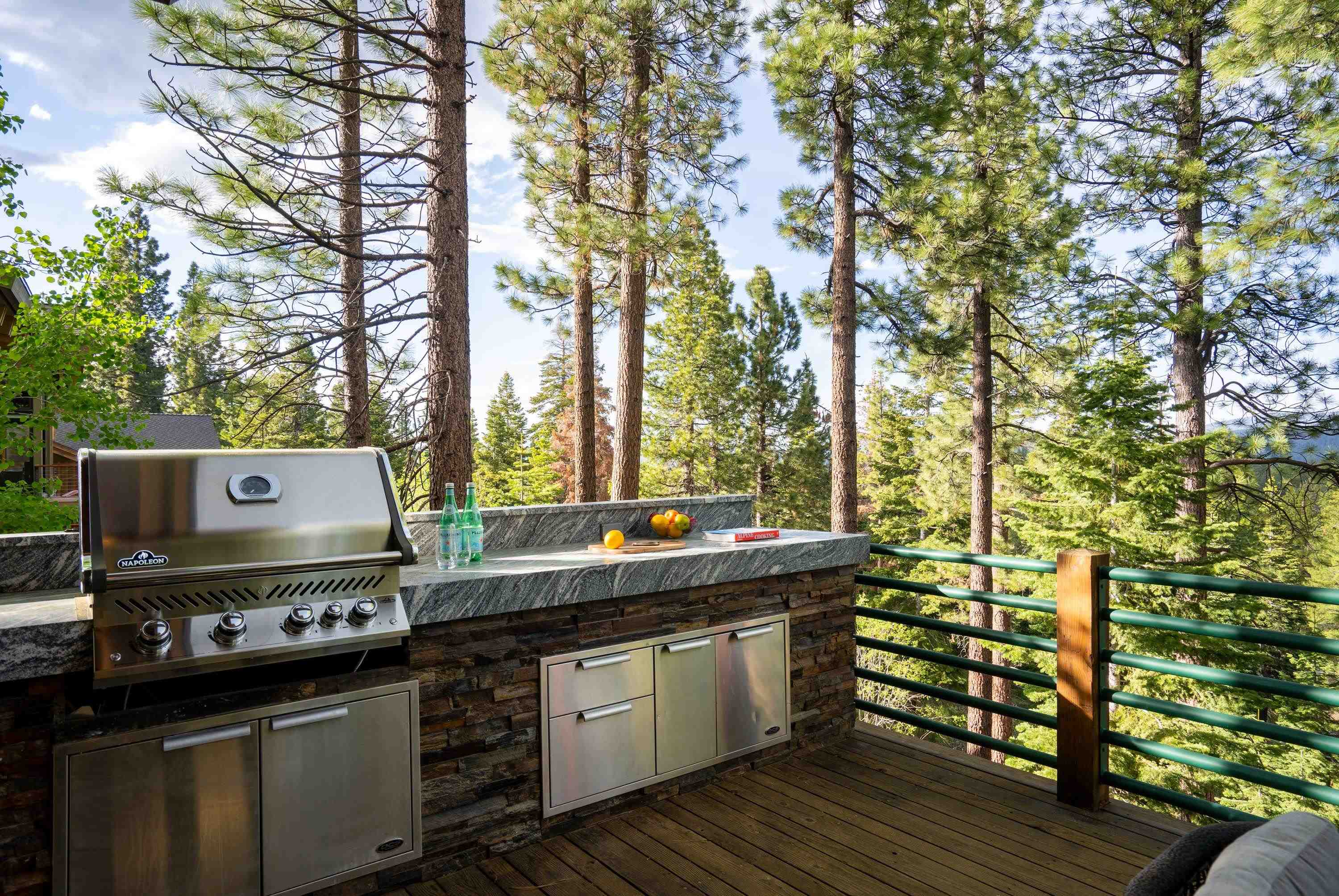 1723 Grouse Ridge Road Truckee, CA 96161 - Photo 24 of 27 a kitchen with a stove and wooden cabinets
