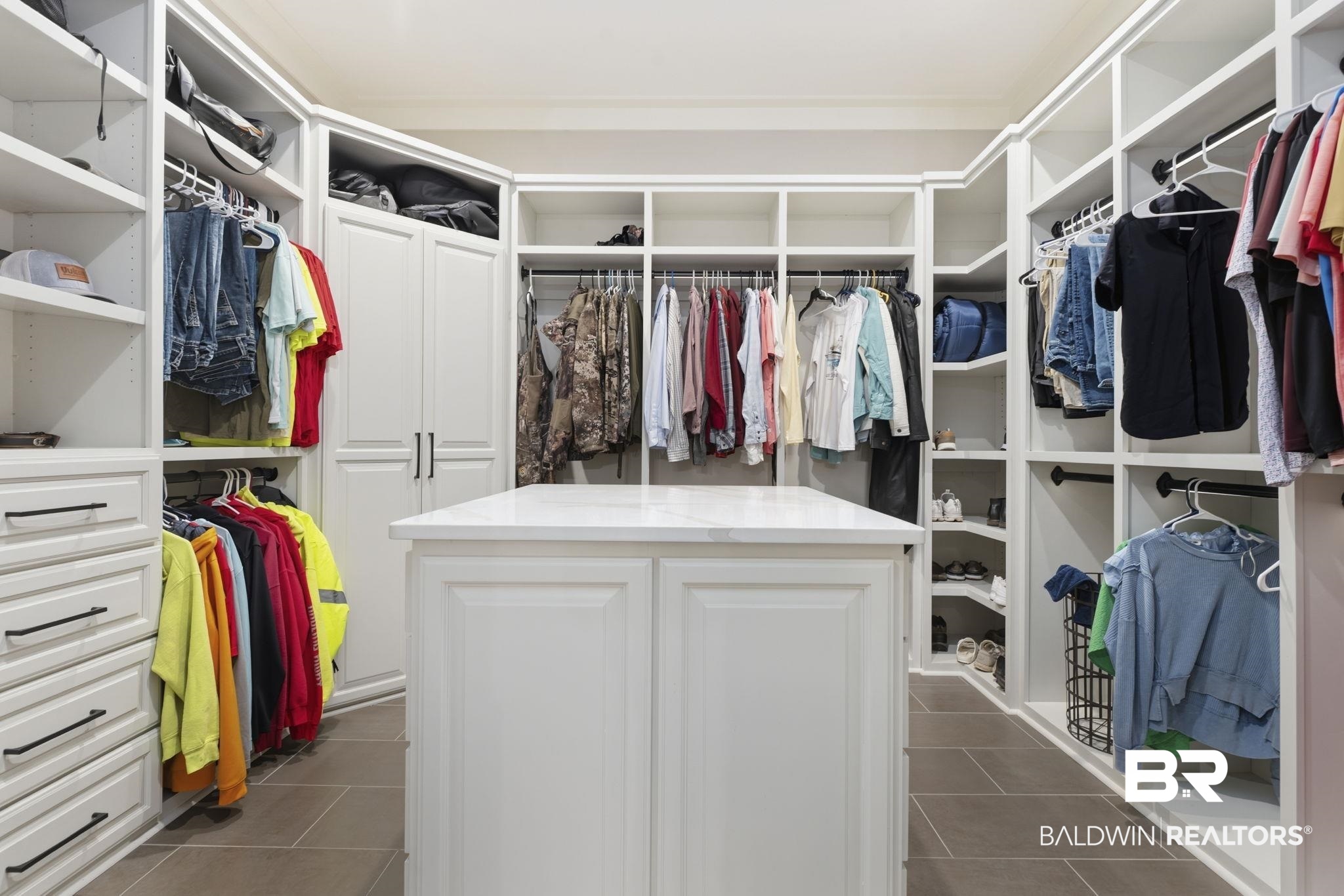 9501 Ben Hamilton Road Theodore, AL 36582 - Photo 29 of 69 Walk in closet featuring dark tile patterned flooring