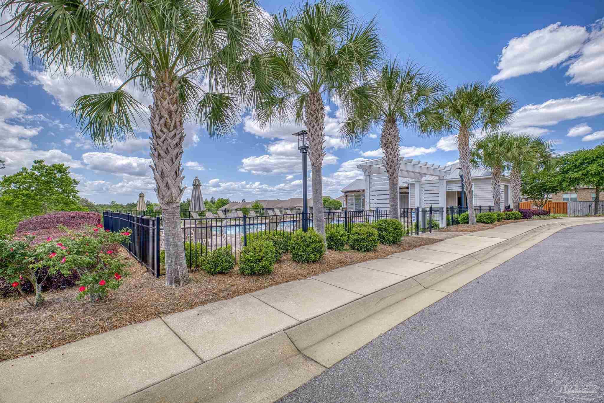 7902 Burnside Loop Pensacola, FL 32526 - Photo 41 of 47 a view of a street with a palm trees