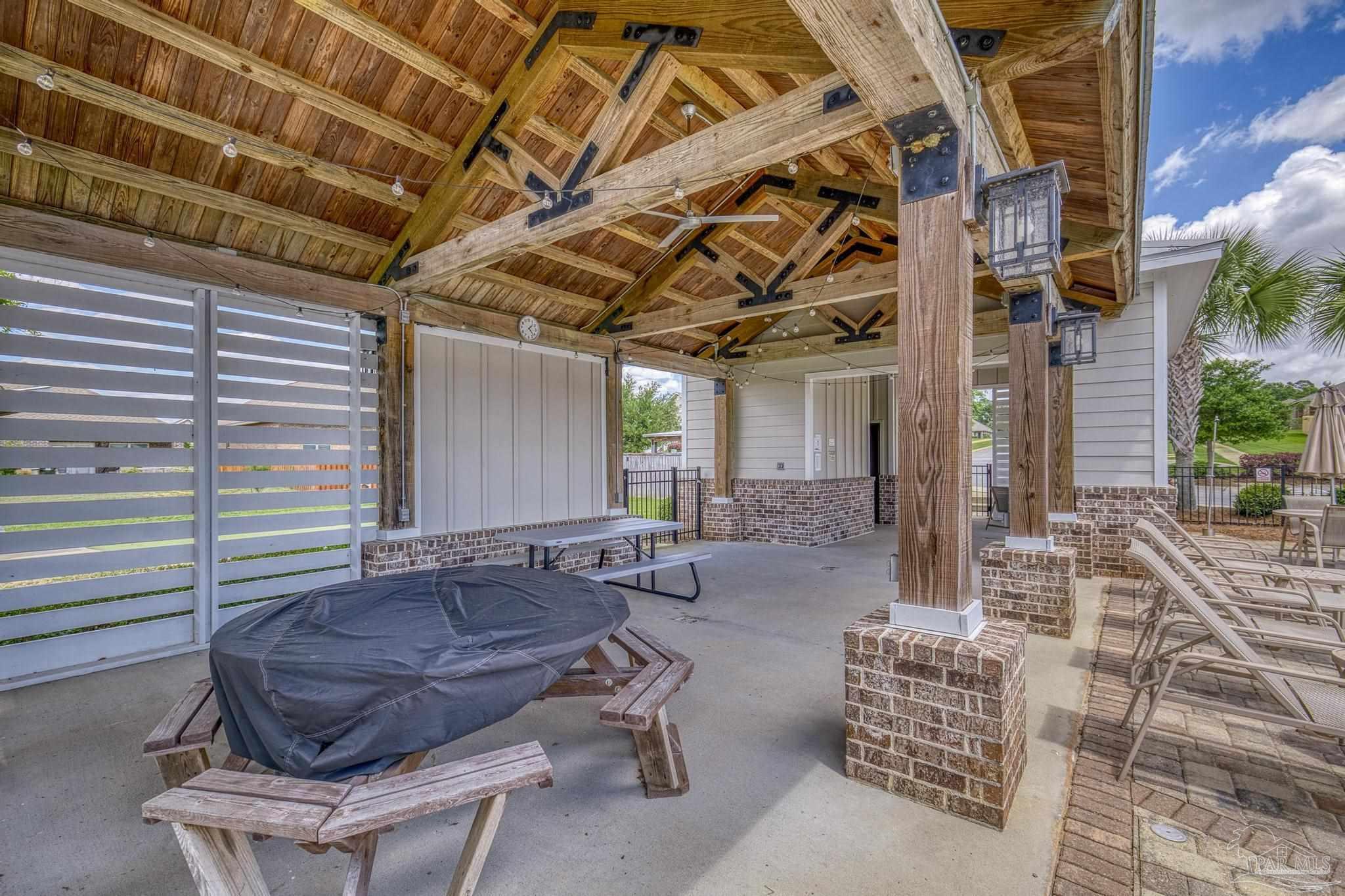 7902 Burnside Loop Pensacola, FL 32526 - Photo 42 of 47 a outdoor space with patio lots of furniture and windows